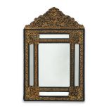 A LARGE FLEMISH BRASS REPOUSSE AND EBONISED MIRROR, LATE 19TH CENTURY