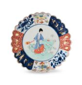 A BOW PORCELAIN POLYCHROME KANGXI-STYLE PLATE WITH SCALLOPED RIM, CIRCA 1755