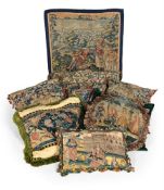A COLLECTION OF ELEVEN CUSHIONS AND A TAPESTRY FRAGMENT, EARLY 18TH CENTURY AND LATER