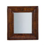 A WILLIAM & MARY WALNUT 'CUSHION' FRAME MIRROR, CIRCA 1690
