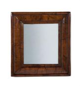 A WILLIAM & MARY WALNUT 'CUSHION' FRAME MIRROR, CIRCA 1690