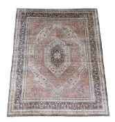 A FINE SILK CARPET