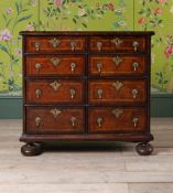 A WILLIAM & MARY BURR ELM CHEST OF DRAWERS, CIRCA 1710