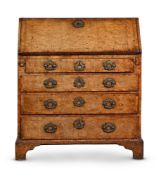 A GEORGE II WALNUT AND BURR WALNUT BUREAU, CIRCA 1740