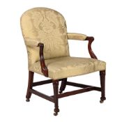 A GEORGE III MAHOGANY ARMCHAIR, IN THE MANNER OF THOMAS CHIPPENDALE, CIRCA 1770