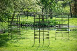 A SET OF THREE LARGE IRON CIRCULAR TREE GUARDS, CONTEMPORARY