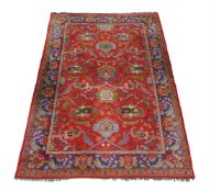 A LARGE DONEGAL CARPET, ATTRIBUTED TO GAVIN MORTON & G.K. ROBERTSON, CIRCA 1900