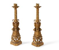 AFTER GIOVANNI BATTISTA PIRANESI, A PAIR OF ITALIAN GILT BRONZE CANDLESTICKS, LATE 19TH CENTURY