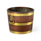 AN UNUSUAL GEORGE III MAHOGANY AND BRASS MOUNTED BUCKET, CIRCA 1780
