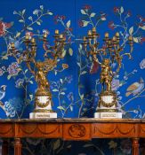 A LARGE PAIR OF ORMOLU AND WHITE MARBLE CHERUB EIGHT LIGHT CANDELABRA, FRENCH, 19TH CENTURY