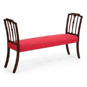 A CARVED MAHOGANY AND UPHOLSTERED WINDOW SEAT, CIRCA 1790 AND LATER