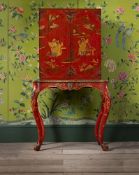 A RED LACQUER AND JAPANNED CABINET ON STAND, EARLY 19TH CENTURY