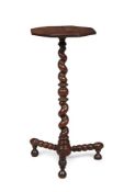 A CHARLES II YEW WOOD CANDLESTAND, CIRCA 1670