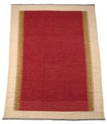 A FLATWOVEN KILIM, IN SWEDISH STYLE