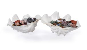 A PAIR OF CLAM SHELLS FILLED WITH A VARIETY OF CRYSTALS
