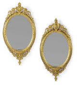 A PAIR OF GILTWOOD OVAL MIRRORS, MID 19TH CENTURY