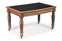 AN EARLY VICTORIAN BLEACHED OAK BOW-FRONT WRITING-TABLE, MID 19TH CENTURY