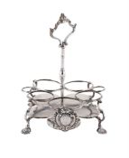 A GEORGE III SILVER WARWICK CRUET STAND