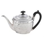 A GEORGE III SILVER OVAL TEA POT