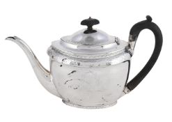 A GEORGE III SILVER OVAL TEA POT