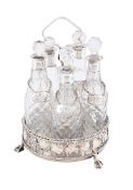 A SILVER FIVE BOTTLE CRUET STAND