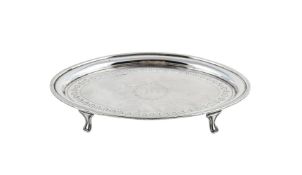 A GEORGE III SILVER OVAL TEA POT STAND
