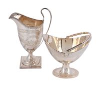 A WILLIAM IV SILVER HELMET SHAPED CREAM JUG