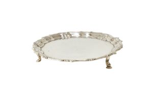 A GEORGE III SILVER SHAPED CIRCULAR WAITER