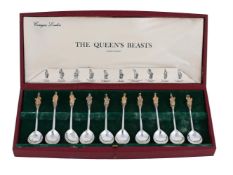 A CASED SET OF TEN SILVER GILT SPOONS