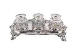 A GEORGE III SILVER SHAPED RECTANGULAR INKWELL