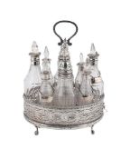 A GEORGE III SILVER EIGHT BOTTLE CRUET STAND