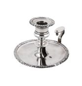 A GEORGE IV SILVER CHAMBERSTICK