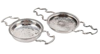 A GEORGE III SILVER TEA/LEMON STRAINER