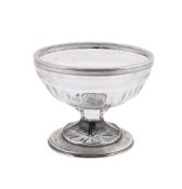A WILLIAM IV SILVER MOUNTED OVAL CUT GLASS SUGAR BOWL