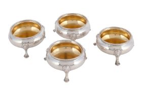 A SET OF FOUR VICTORIAN SILVER CAULDRON SALTS