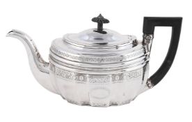A GEORGE III SILVER OVAL TEAPOT