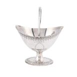 A GEORGE III SILVER SWING HANDLED OVAL BASKET