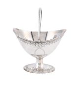 A GEORGE III SILVER SWING HANDLED OVAL BASKET