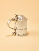 A GEORGE I SILVER TANKARD