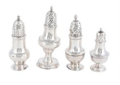 FOUR SILVER SUGAR CASTERS