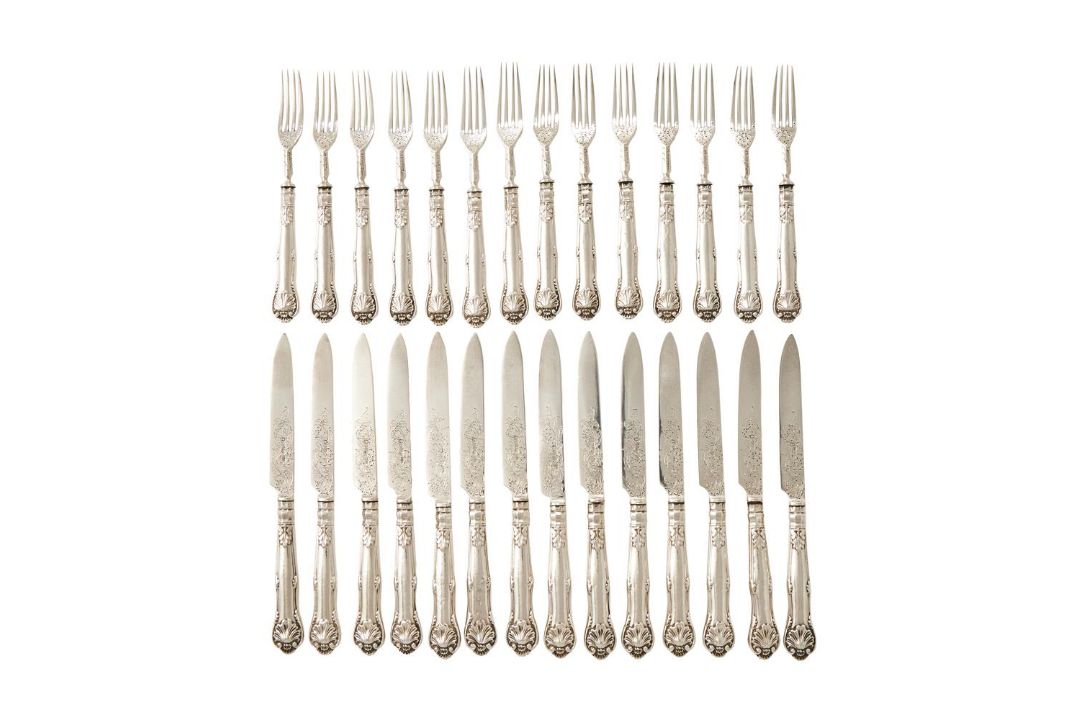A SET OF FOURTEEN WILLIAM IV SILVER KING'S PATTERN FRUIT KNIVES AND FORKS