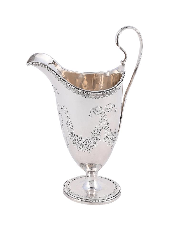 A GEORGE III SILVER HELMET SHAPED CREAM JUG - Image 2 of 3