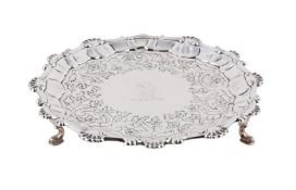 A GEORGE III SILVER SHAPED CIRCULAR WAITER