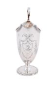 A GEORGE III SILVER HELMET SHAPED CREAM JUG