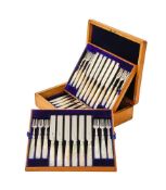 Y A CASED SET EIGHTEEN SILVER AND MOTHER OF PEARL FRUIT KNIVES AND FORKS
