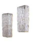 MANNER OF J.T KALMAR (AUSTRIAN), A PAIR OF CLEAR TEXTURED GLASS WALL LIGHTS, MODERN