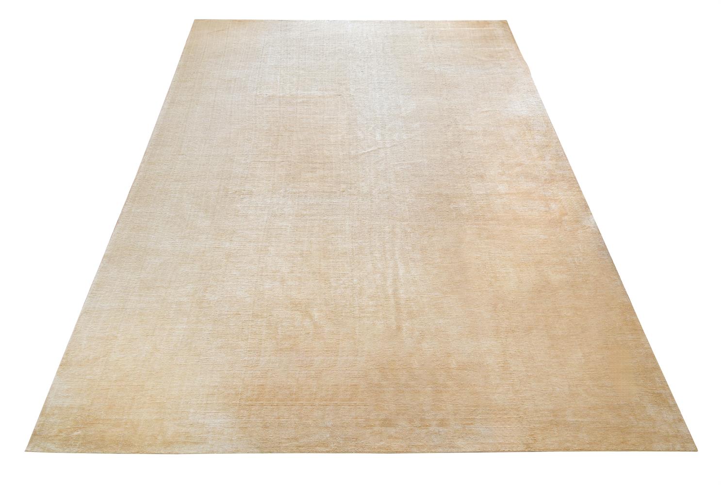 A CREAM SILK STRIPED CARPET