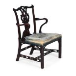 A GEORGE III MAHOGANY AND LEATHER UPHOLSTERED OPEN ARMCHAIR, CIRCA 1800