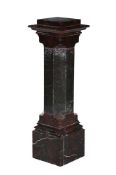 A RED SERPENTINE MARBLE COLUMN PEDESTAL, 19TH CENTURY