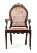 AN ANGLO-INDIAN HARDWOOD ARMCHAIR, MID 19TH CENTURY